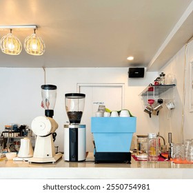 Coffee shop interior with a modern and minimalist style, coffee shop bar with a machine and coffee grinder - Powered by Shutterstock