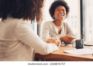 Coffee shop, meeting and black women laughing for funny conversation, b2b networking and business planning together. Happy african people or friends in restaurant or cafe for remote work and talking - Powered by Shutterstock