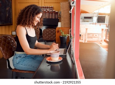 Coffee Shop Owner, Cafe Manager Or Startup Company Woman On Her Laptop Working, Planning And Organizing Project Ideas For Website. Happy, Smiling And Excited Business Freelancer Doing SEO Research