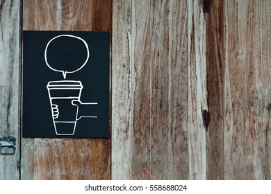 The Coffee Shop Sign On Wooden Wall