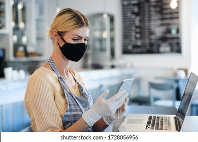 Coffee Shop Woman Owner Working With Face Mask, Open After Lockdown Quarantine.