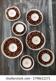 Coffee solves everything! coffee beans placed in white cup.