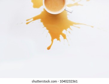 Coffee With Spilled Coffee Background.  Cut Coffee Cup On A White Background. Flat Lay. Morning. Top View. Copy Space.