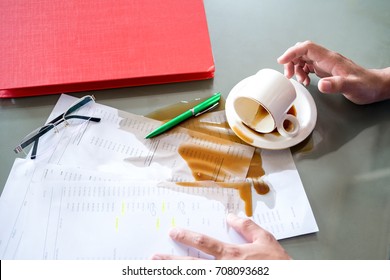 Coffee Spilled On The Desk While Working.