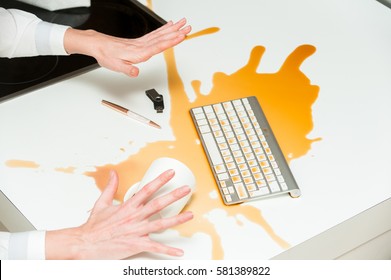 Coffee Spilled On Modern Keyboard.