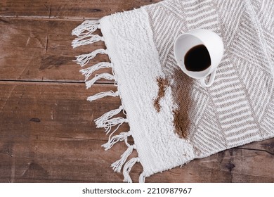 Coffee Spilling From Cup On Carpet. Domestic Life. The Concept Of Cleaning Stains. High Quality Photo