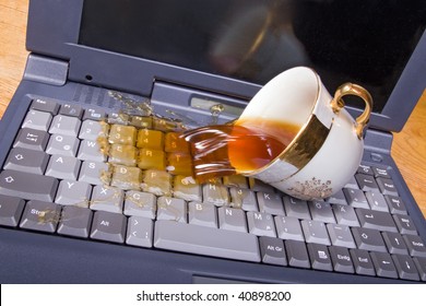 Coffee Spilling On Keyboard. Drink Pouring Into The Computer Keyboard. Accident Office. Beverage From The Cup Was Poured To Computer. Damaged Laptop With Suddenly Pollution Of Keyboard.