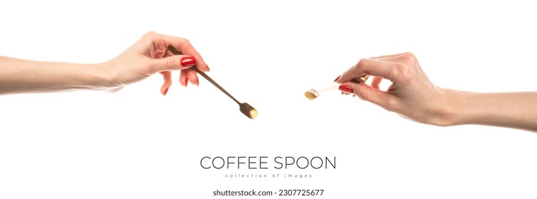 Coffee spoon in hand on white background. High quality photo
