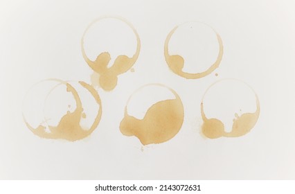 Coffee stains and splashes, dirty brown cup rings. Splash ring form coffee mug, circle stain dirty mark