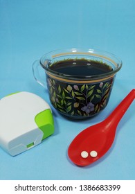 Coffee, Stevia On Plastic Spoon Over Blue Background 