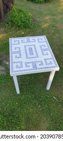 Coffee table with handmade ceramic mosaic