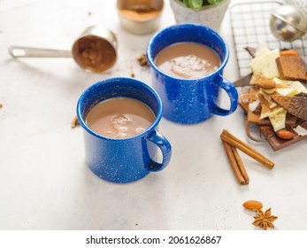 Coffee Table. Two Cups Of Coffee, Sweets, Decor. White Background. Valentine's Day, Romantic Breakfast, Festive Atmosphere. The Look Of A High Angle. There Are No People In The Photo.
