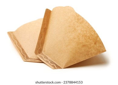 Coffee and tea filter paper on white background