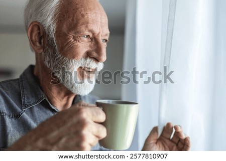 Coffee, thinking or face of an old man by window in retirement with ideas or memory in living room. Lonely, remember or elderly person looking or wondering about future in home alone drinking tea.