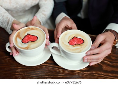 Coffee time, coffee break. Wedding day. Couple in cafe