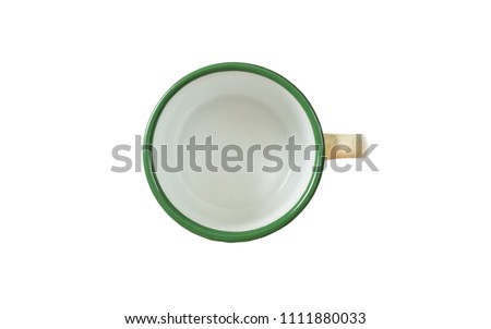 Coffee time concept. Empty coffee mug, enamel, green detail, with top view, cut out, isolated on a white background