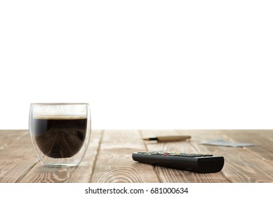 Coffee And TV Remote Control On The Table