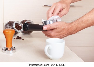 Coffeemaker Wipes Holder Before Making Coffee Above The Table.