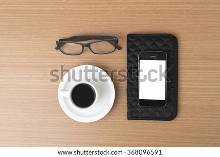 Similar – Business objects, cup of coffee, pen, phone and glasses.