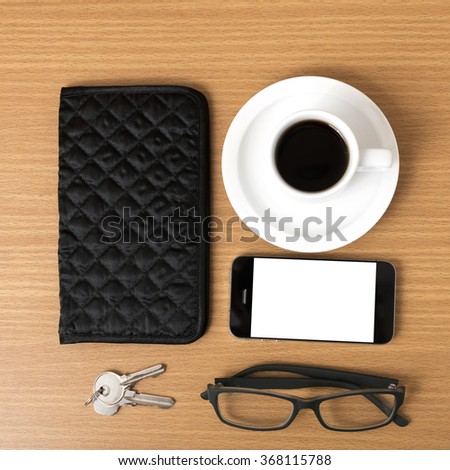 Similar – Business objects, cup of coffee, pen, phone and glasses.