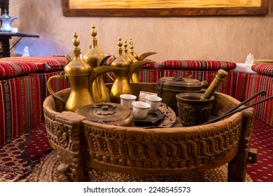 coffeepot and a coffee mug. Drinking coffee in the Arabic style. Coffee house