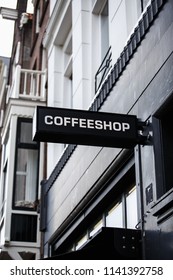 Coffeeshop Signboard On Building Exterior In The Street Of Amsterdam.