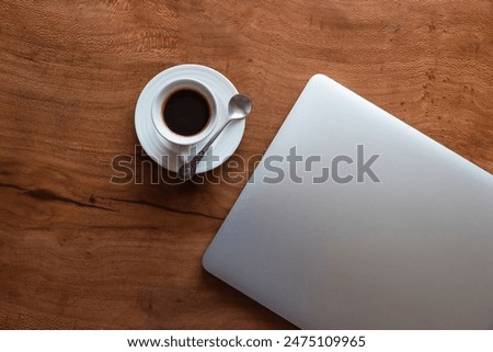 Coffeetime at a distant working desk 