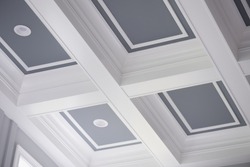 Coffered Ceiling With White Paint And Blue Inside

