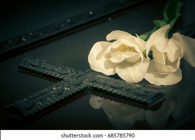 Coffin With White Flowers