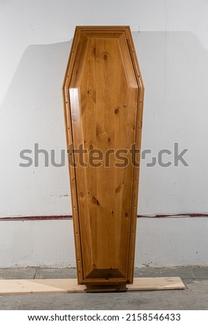 Coffins are presented in shop of undertaker