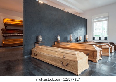 Coffins Standing In Funeral House