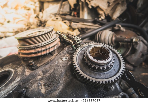 Cog or gear of old engine which removed from\
the car for replacement the new\
one