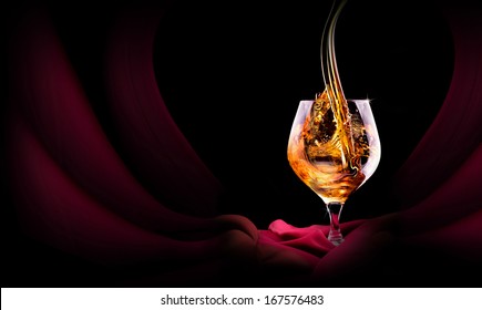 Cognac or brandy on a  black background