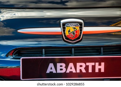 Cognac, France - August 30, 2016: Tight Map On The Front Of A Fiat Model Abarth Car With Logo Of The Brand, Chrome Grille And Name Of The Brand Written On The License Plate