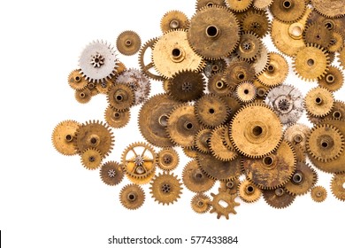 Cogs gears wheels steampunk elements on white background. Vintage clockwork parts closeup. Abstract shape object with many textured aged clockwork details.