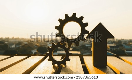 Cogwheels and up Arrows, Operational excellence, Optimize technology, innovation, production growth concept.