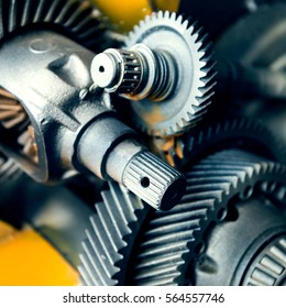 Cogwheels machinery , engineering and industry or concepts such as teamwork and search engine - Shutterstock ID 564557746