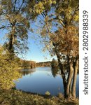 A cohesive visual series capturing the same riverside landscape throughout the year, illustrating the passage of time and the natural transformation of the environment across changing seasons. From fresh spring growth to lush summer greenery, warm autumn colors, quiet winter stillness, and atmospheric fog, the images document the continuous cycle of nature. This collection reflects the flow of time, seasonality, and the evolving character of a single place shaped by weather, light, and natural processes.