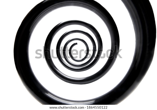 coil spring within spiral in black\
steel car suspension system spare parts, iron object replacement\
part inside view isolated on white background,\
nobody.