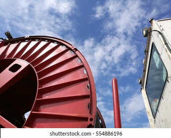 Coil Tubing Roll Truck In Front Of Sky