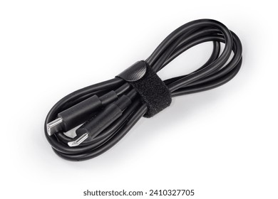 Coiled black braided sleeving cable USB with plugs USB Type-C at the both edges on a white background 
