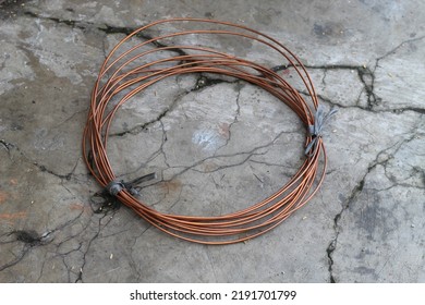 Coiled Copper Wire Lying On The Floor