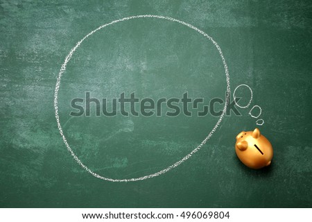 coin box with the thinking bubble on the blackboard