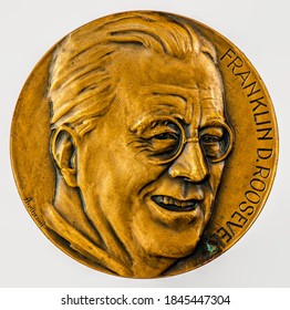 A coin commemorating featuring a portrait of  Franklin Delano Roosevelt. 32nd President of the United States. Commemorative Coin.