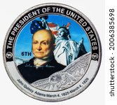 A coin commemorating featuring a portrait The President of The United States.