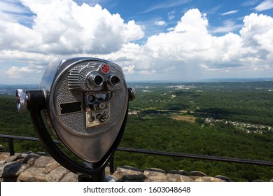 Coin operated binoculars at Seven States viewpoint at Rock City, atop of iconic Lookout Mountain, Georgia. The city of Chattanooga Tennessee is nearby.