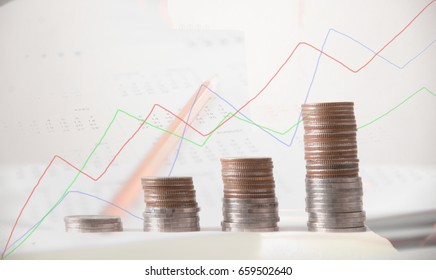 coin showing graph in business concept.