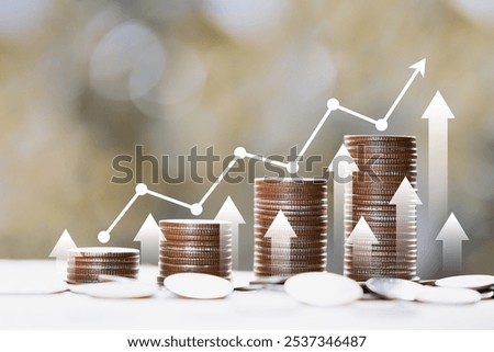 Coin stack with arrow graph, financial concepts and financial investment business stock growth