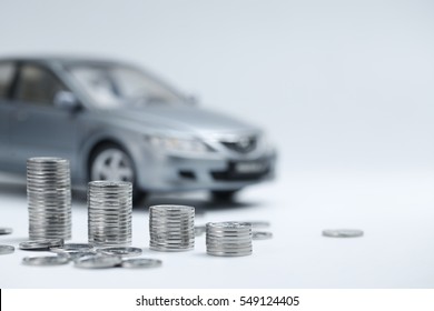 coin stacks in front of car