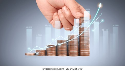 Coin with trading graph financial investment concept - Shutterstock ID 2314266949